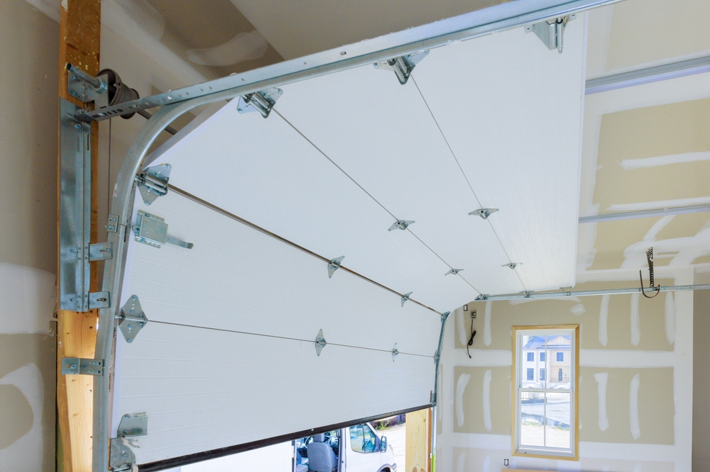 The Importance of Regular Garage Door Maintenance: How Often Should You Service Your Garage Door?